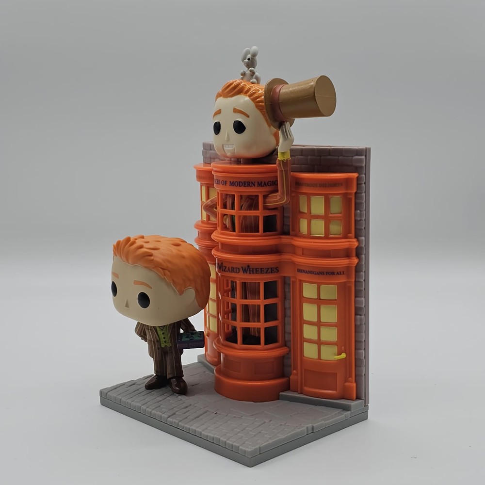 Funko Pop Deluxe Fred Weasley With Weasleys' Wizard Wheezes #158 (Sem Caixa)